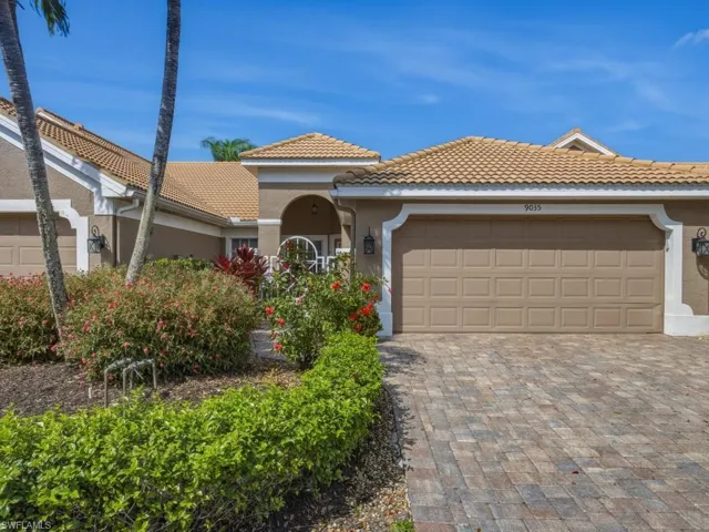 Mediterranean / spanish-style home featuring stucco siding, a tile roof, decorative driveway, and an attached garage