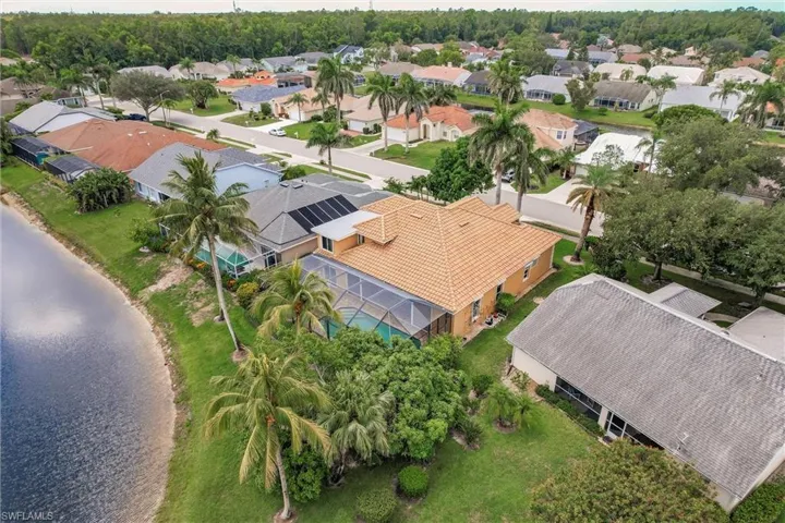 Aerial view of residential area with a nearby body of water