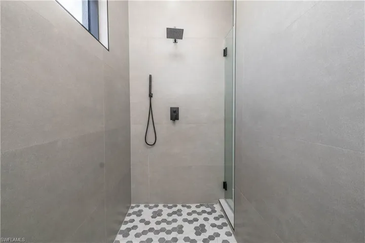 Full bathroom with a stall shower /