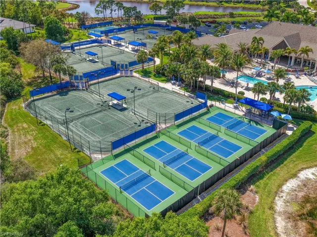 Expansive recreational amenities featuring multiple tennis courts, several pickleball courts, and a large clubhouse with swimming pools