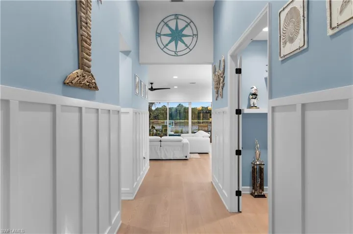 Hall featuring light wood-style floors