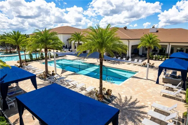 Community pool with a patio area
