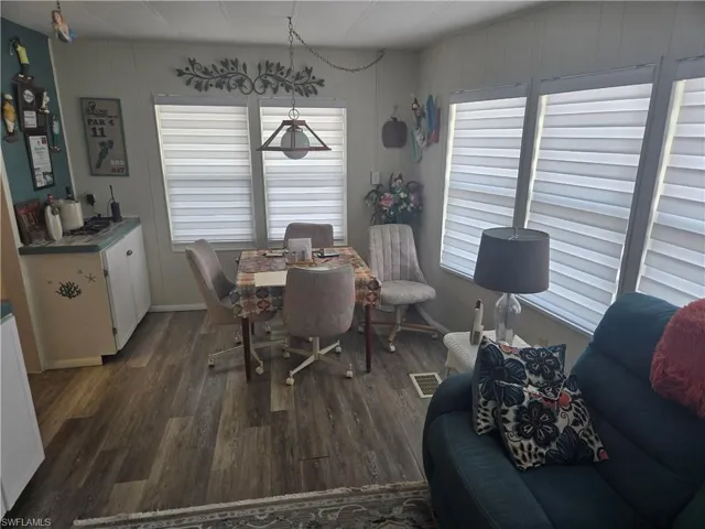 Dining area featuring dark hardwood / wood-style floors