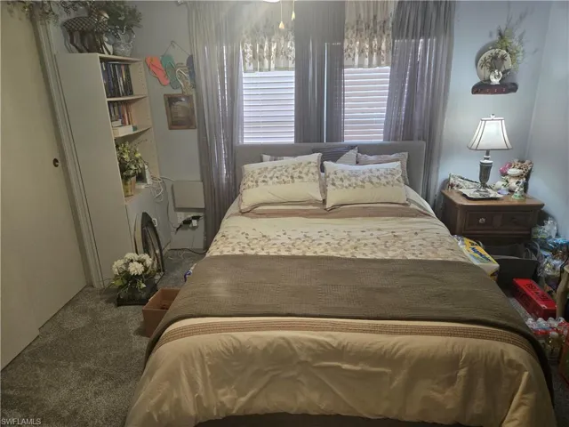 Bedroom with carpet floors
