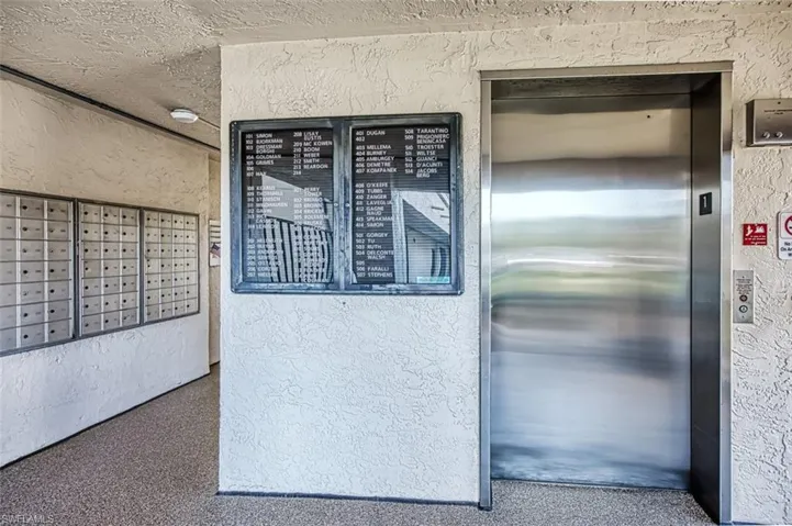 Elevator and mail area