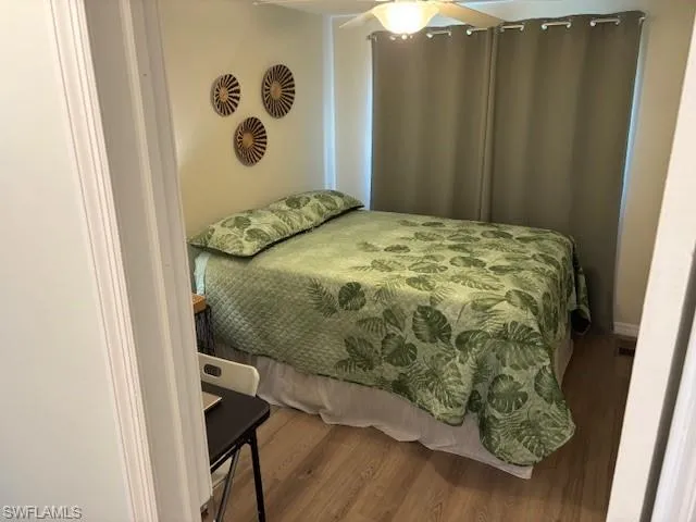 Bedroom featuring wood finished floors