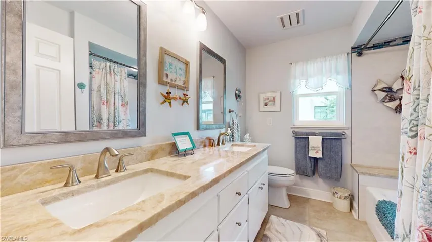 Guest Bath with two sinks.