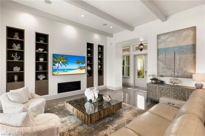Designer built ins with fireplace.
