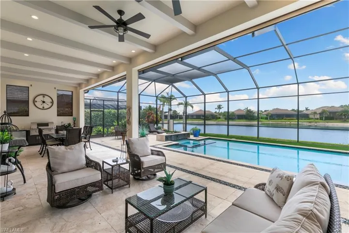 Covered screened lanai with peaceful Lakeview and indoor-outdoor flow.
