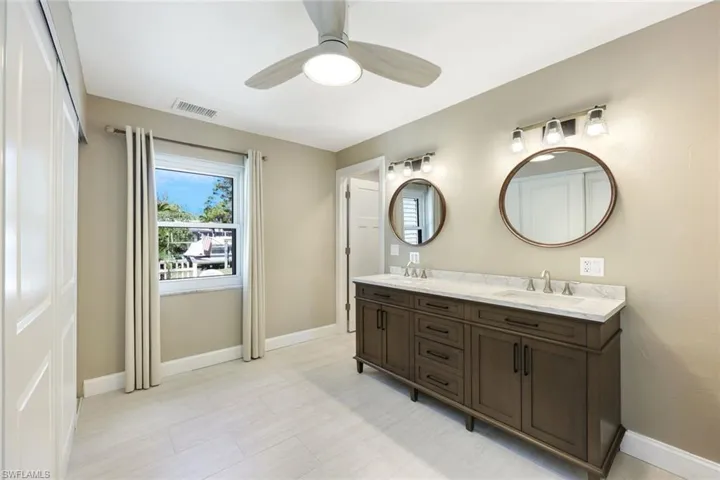 Primary bathroom offers plenty of room for two!