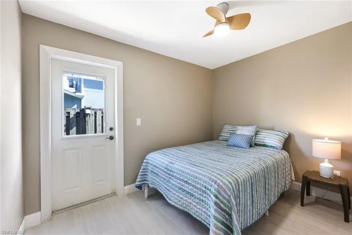Third downstairs bedroom provides private access to outdoors.