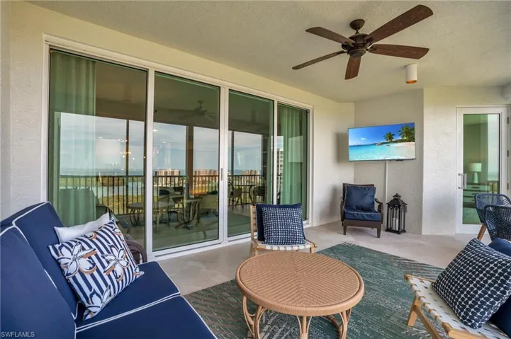 View of terrace featuring ceiling fan