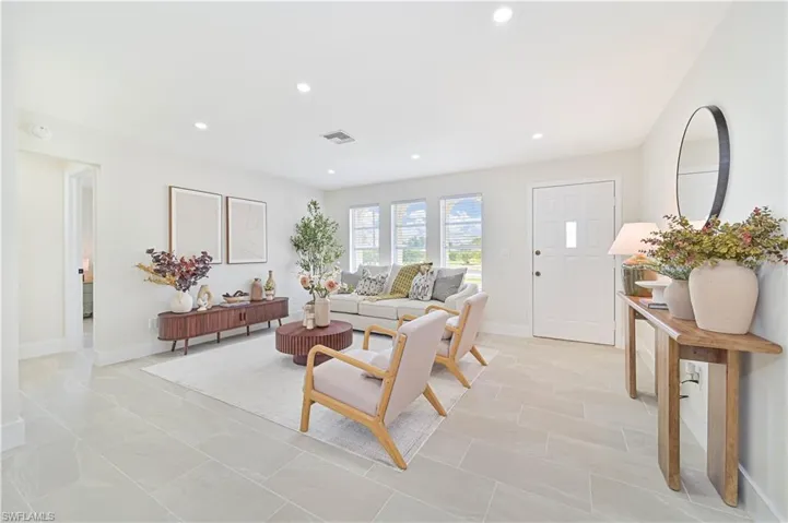 living room and entry and kitchen