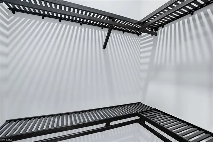 Wooden deck featuring a pergola