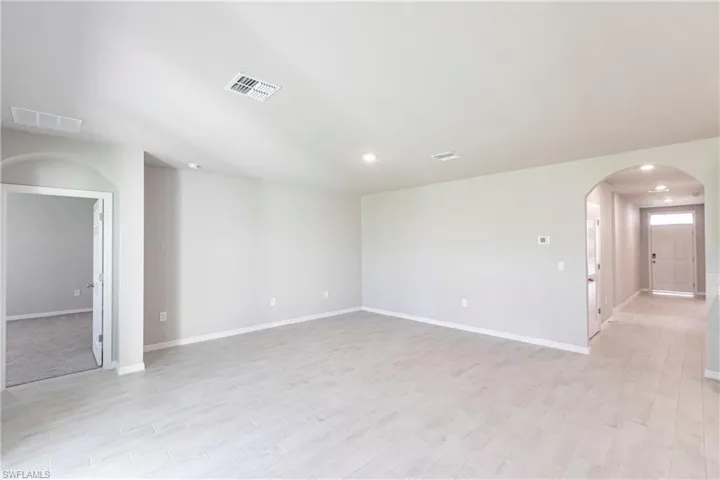 Spare room with light hardwood / wood-style flooring