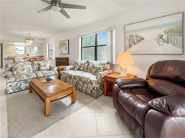 Tiled living room with ceiling fan