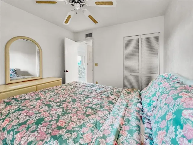 Bedroom with a closet and ceiling fan