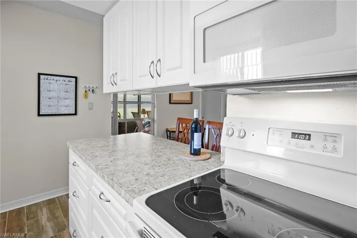 Kitchen. Nice window over the sink for lots of natural light. Updated cabinetry and countertops. Range/oven, washer/dryer, refrigerator with water/ice on the door. All kitchen items are included.