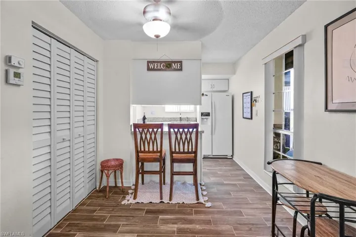 Upgraded/updated tile flooring. Breakfast bar. Kitchen/Dining area large window for lots of natural light.
