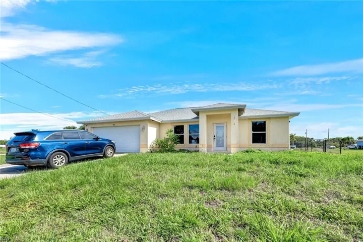 View of front of home with a garage
