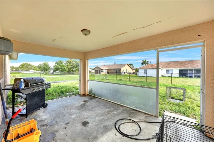 View of terrace featuring area for grilling