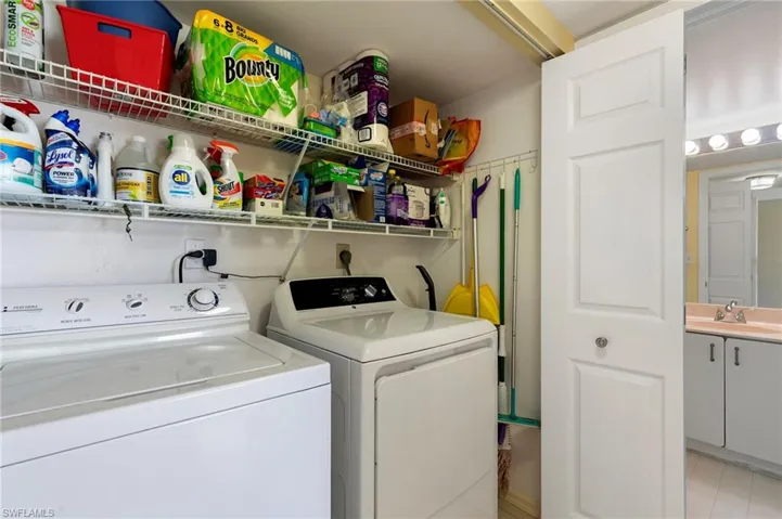 Laundry area near guest bedroom, plenty of storage