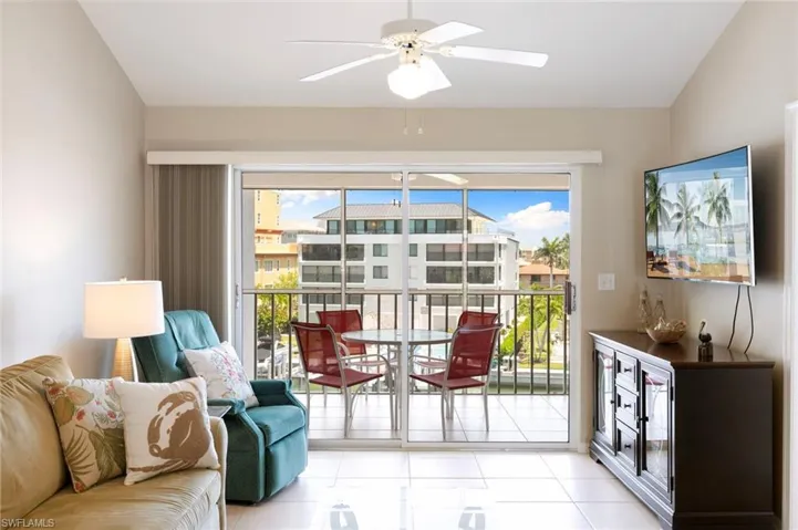 Sliding doors lead out to large lanai with water view