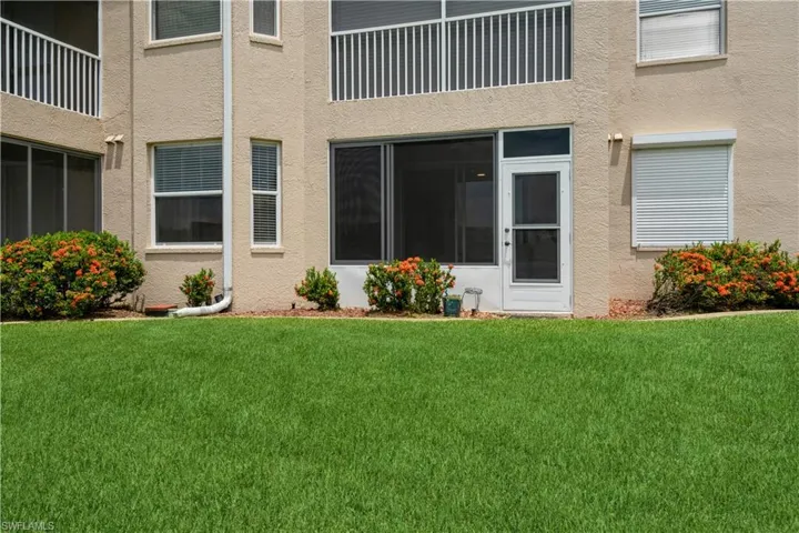 Property entrance with a lawn