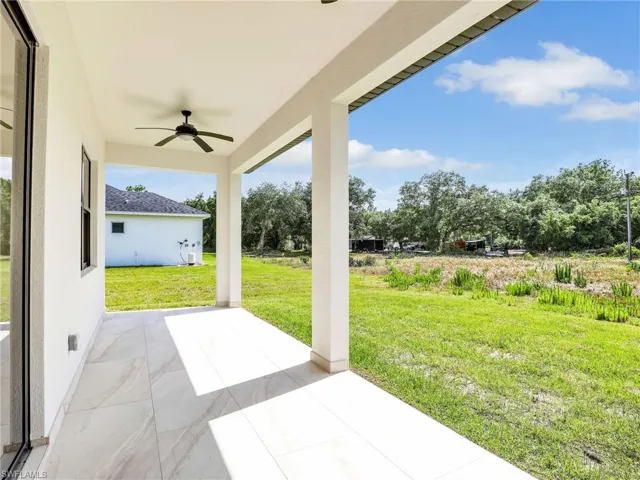 View of patio with ceiling fan