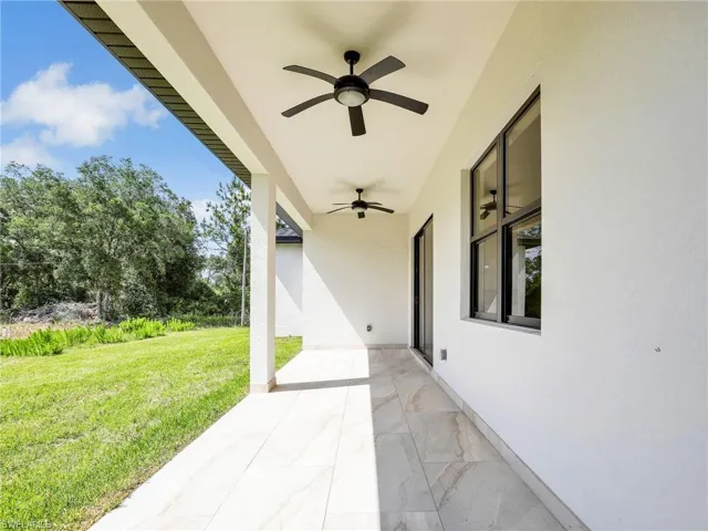 View of patio / terrace with ceiling fan