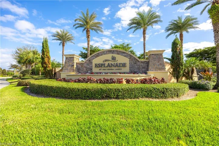 Community sign featuring a yard