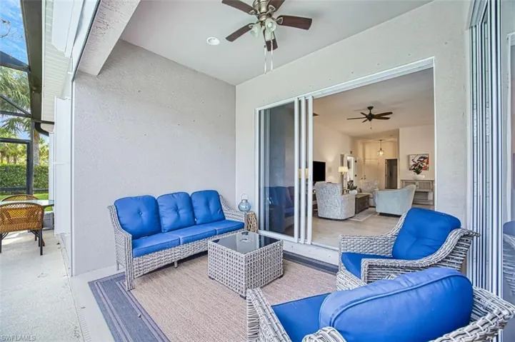 Sunroom featuring a pool