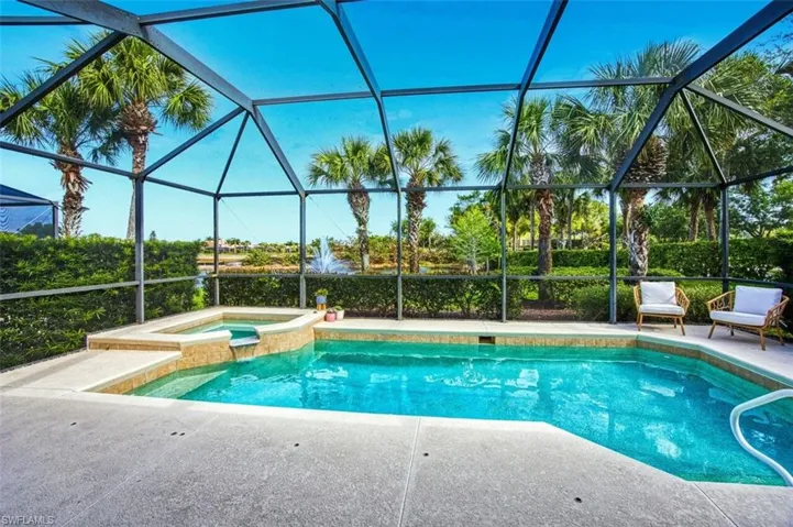 View of patio / terrace featuring an outdoor hangout area, a ceiling fan, and glass enclosure