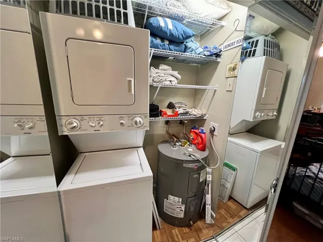 Laundry area with stacked washer / dryer