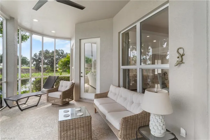 Sunroom / solarium featuring ceiling fan