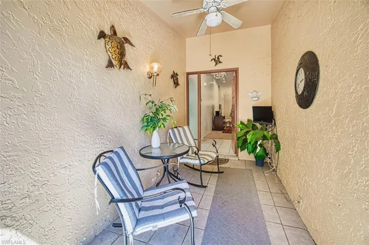 View of patio / terrace featuring a ceiling fan