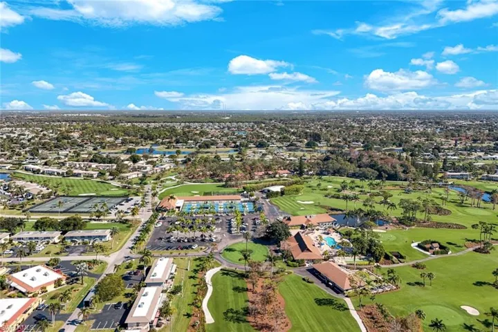 Aerial view of a local golf course and a large body of water