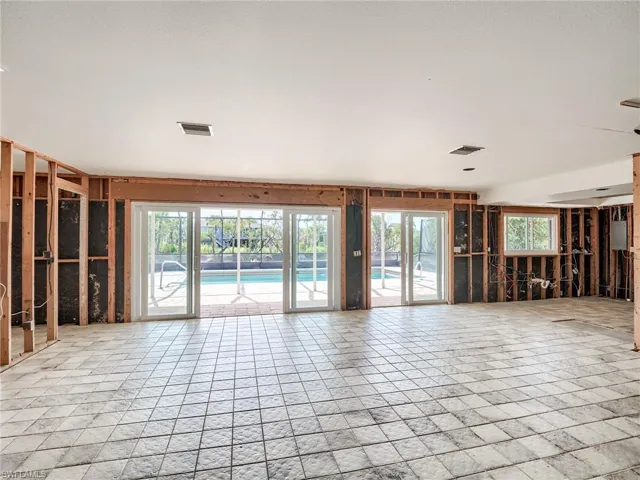Living room and kitchen out to lanai