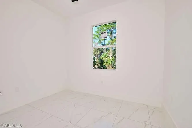 Empty room with marble finish floors