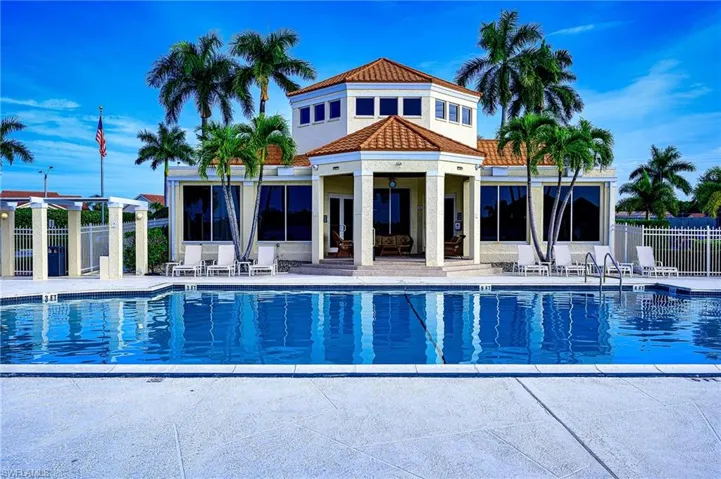 Community pool featuring a patio area