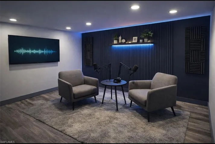 Sitting room featuring recessed lighting and wood finished floors