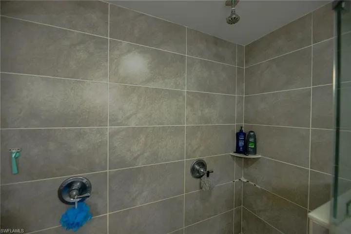 Bathroom with tiled shower