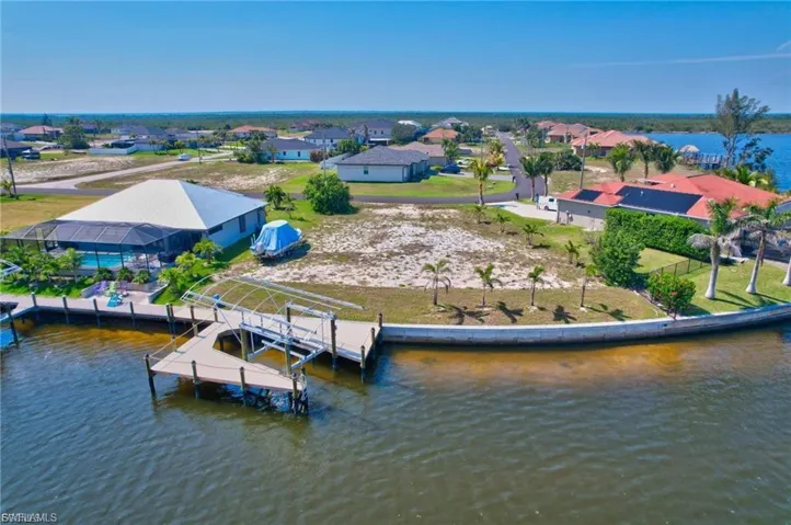 Aerial view of residential area with a nearby body of water