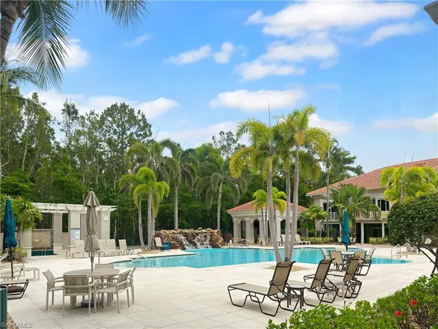 Community pool with a patio area