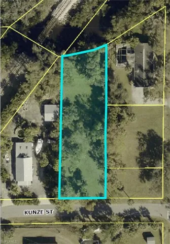 Aerial overview of property's location featuring property parcel outlined