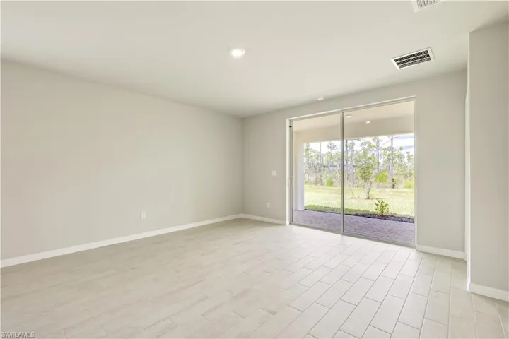 Unfurnished room featuring light wood-type flooring