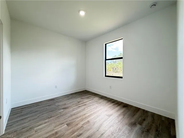 1256  MILWAUKEE  BLVD, Lehigh Acres, FL 33974