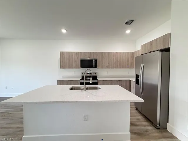 1256  MILWAUKEE  BLVD, Lehigh Acres, FL 33974
