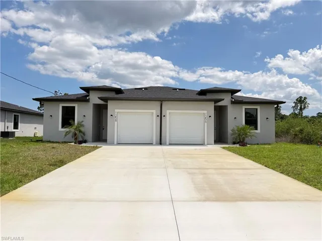 1256  MILWAUKEE  BLVD, Lehigh Acres, FL 33974