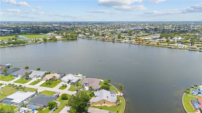 Expansive waterfront neighborhood featuring numerous properties with direct lake access
